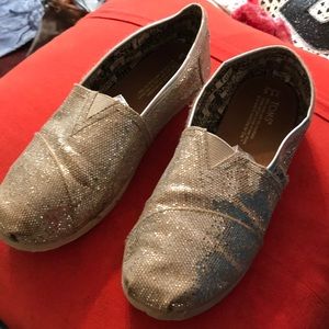 Toms gold glittery slip-ons
